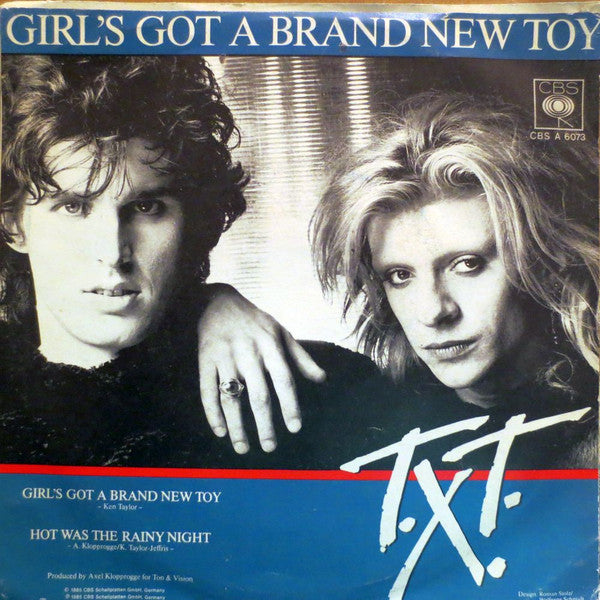 T.X.T. : Girl's Got A Brand New Toy (7")